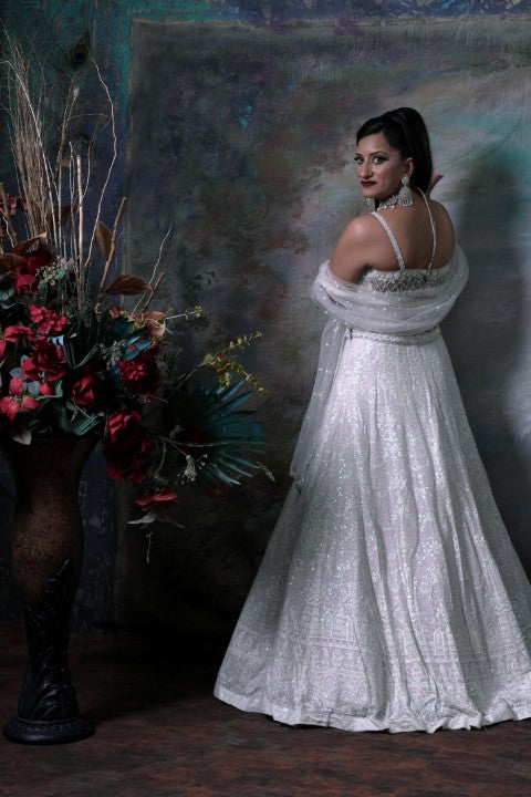 White Sequence Lehenga Choli with Dupatta.