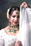 White Lehenga With Full Sleeves Blouse and Dupatta.