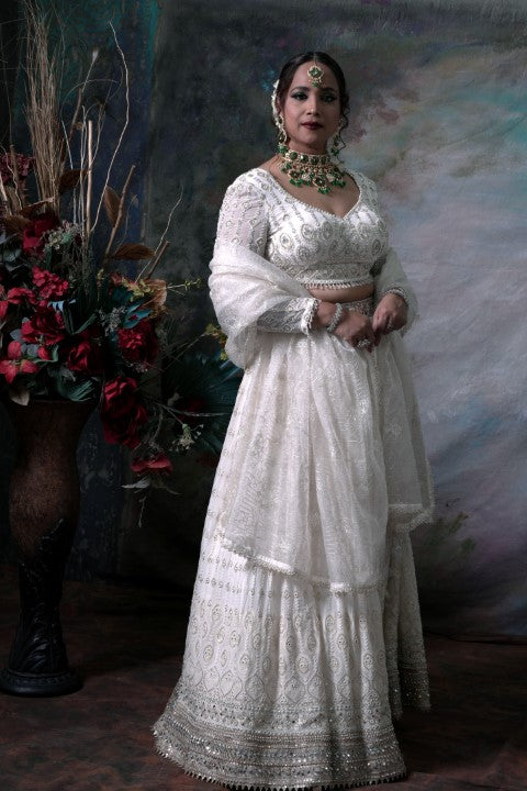 White Lehenga With Full Sleeves Blouse and Dupatta.