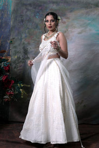 White Lehenga Choli With Dupatta.