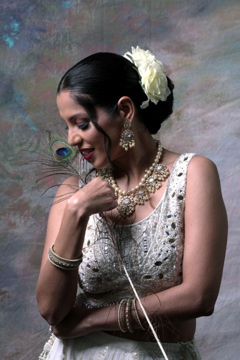White Lehenga Choli With Dupatta.