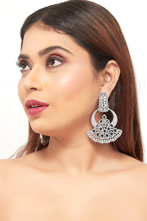 Earrings, designer earrings, fashion earrings, statement earrings, stud earrings, hoop earrings, drop earrings, dangle earrings, gold earrings, silver earrings, gemstone earrings, bridal earrings, traditional earrings, modern earrings, handcrafted earrings, pearl earrings, diamond earrings, ethnic earrings, trendy earrings, party wear earrings, daily wear earrings, luxury earrings.