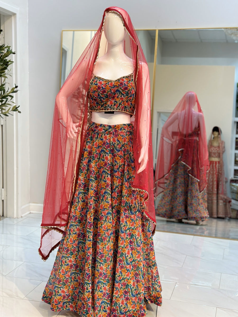 Fancy Multi Color Lehenga & Designers Multi Color Blouse with Pink Dupatta.