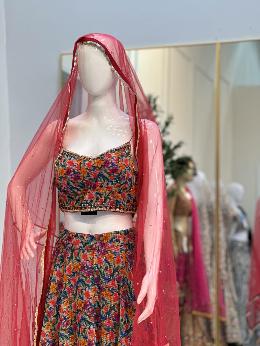 Fancy Multi Color Lehenga & Designers Multi Color Blouse with Pink Dupatta.