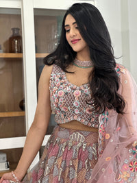 Boho Mauve Lehenga Choli with Pastel Embroidery, Pearl Work, and Tassels with Net Dupatta