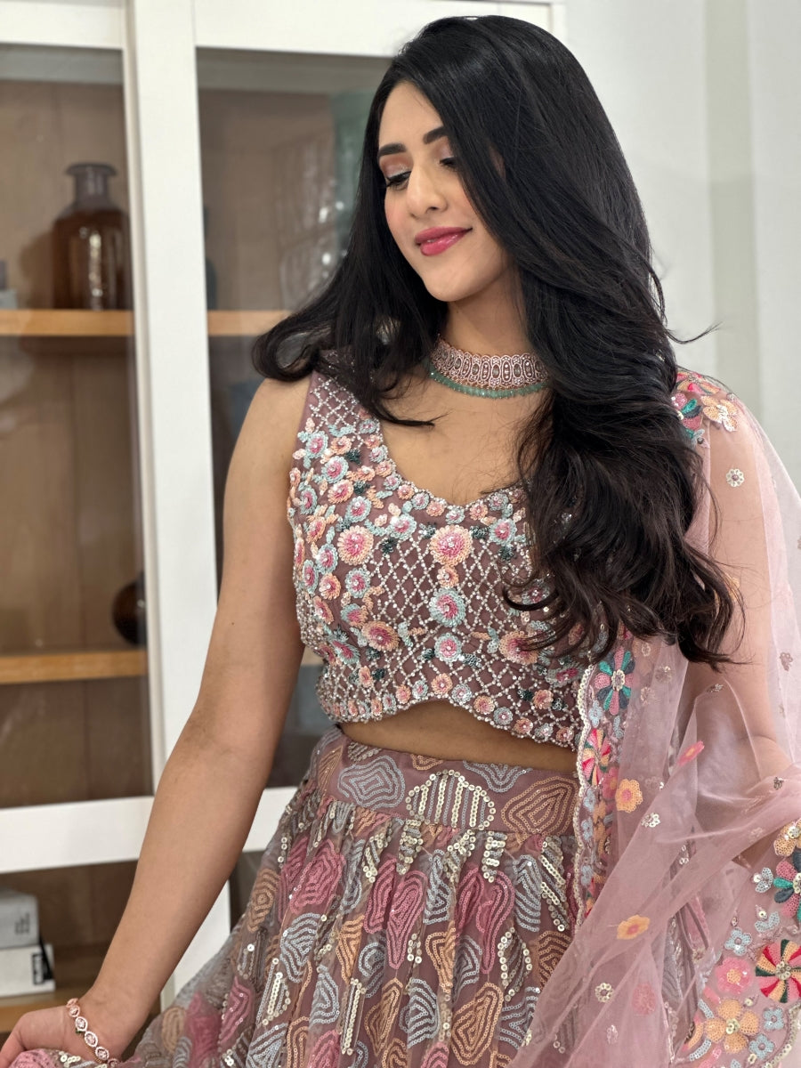 Boho Mauve Lehenga Choli with Pastel Embroidery, Pearl Work, and Tassels with Net Dupatta