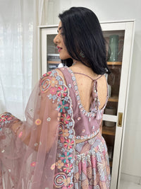 Boho Mauve Lehenga Choli with Pastel Embroidery, Pearl Work, and Tassels with Net Dupatta