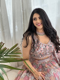 Boho Mauve Lehenga Choli with Pastel Embroidery, Pearl Work, and Tassels with Net Dupatta