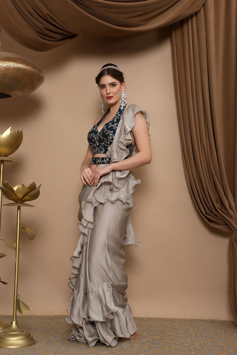 Grey Ruffle Saree, Designer saree, luxury saree, party wear saree, bridal saree, embroidered saree, silk saree, wedding saree, trendy saree, elegant saree, traditional saree, saree online, designer saree collection, fashion saree, festive saree, saree shopping, designer saree online, handcrafted saree, saree for women, saree with blouse, exclusive saree.
