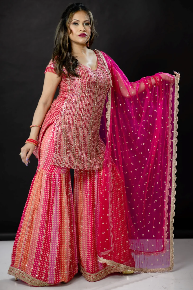 Gharara suit, designer gharara suits, bridal gharara suit, traditional gharara, gharara suit online, party wear gharara, Pakistani gharara suits, gharara dress, latest gharara designs, wedding gharara suit, embroidered gharara, heavy gharara suits, festive gharara, gharara suit for women, ethnic gharara.