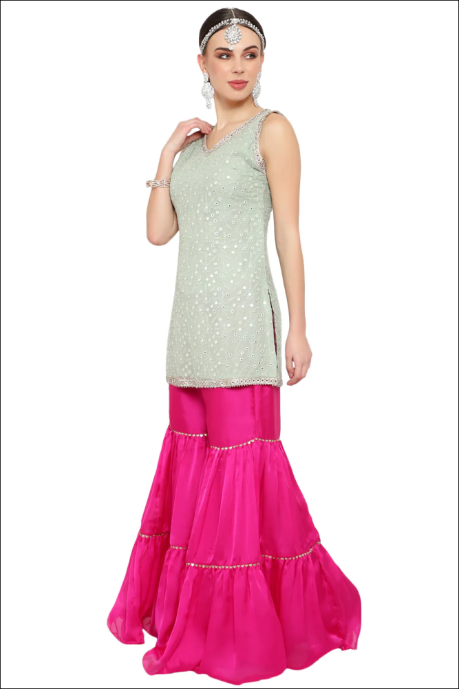 Gharara suit, designer gharara suits, bridal gharara suit, traditional gharara, gharara suit online, party wear gharara, Pakistani gharara suits, gharara dress, latest gharara designs, wedding gharara suit, embroidered gharara, heavy gharara suits, festive gharara, gharara suit for women, ethnic gharara.