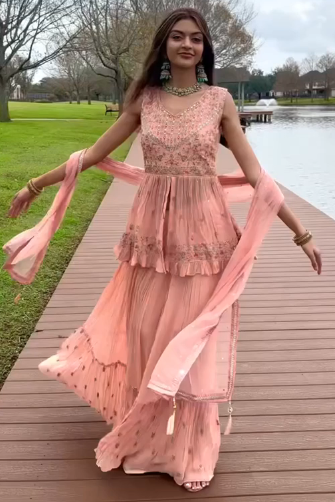 Gharara suit, designer gharara suits, bridal gharara suit, traditional gharara, gharara suit online, party wear gharara, Pakistani gharara suits, gharara dress, latest gharara designs, wedding gharara suit, embroidered gharara, heavy gharara suits, festive gharara, gharara suit for women, ethnic gharara.
