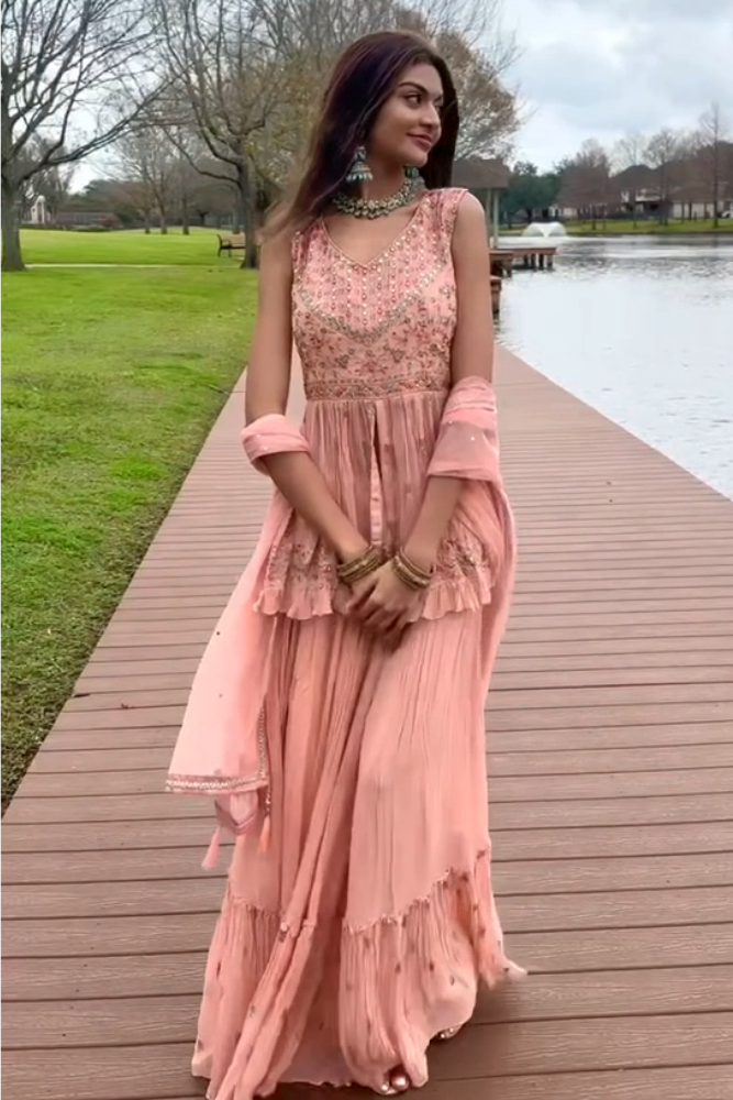 Gharara suit, designer gharara suits, bridal gharara suit, traditional gharara, gharara suit online, party wear gharara, Pakistani gharara suits, gharara dress, latest gharara designs, wedding gharara suit, embroidered gharara, heavy gharara suits, festive gharara, gharara suit for women, ethnic gharara.
