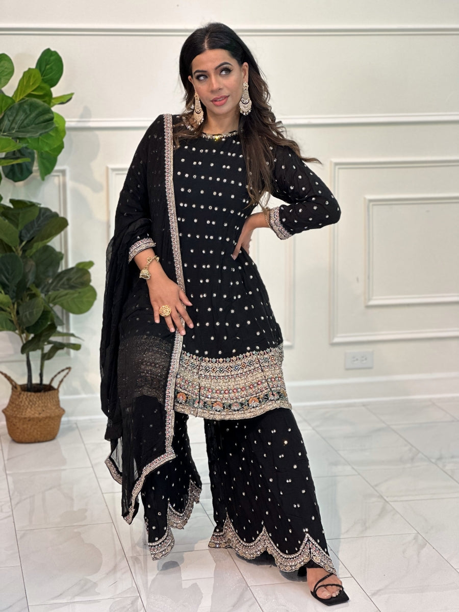Gharara suit, designer gharara suits, bridal gharara suit, traditional gharara, gharara suit online, party wear gharara, Pakistani gharara suits, gharara dress, latest gharara designs, wedding gharara suit, embroidered gharara, heavy gharara suits, festive gharara, gharara suit for women, ethnic gharara.
