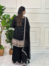 Gharara suit, designer gharara suits, bridal gharara suit, traditional gharara, gharara suit online, party wear gharara, Pakistani gharara suits, gharara dress, latest gharara designs, wedding gharara suit, embroidered gharara, heavy gharara suits, festive gharara, gharara suit for women, ethnic gharara.