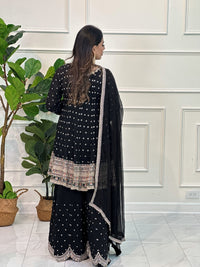 Gharara suit, designer gharara suits, bridal gharara suit, traditional gharara, gharara suit online, party wear gharara, Pakistani gharara suits, gharara dress, latest gharara designs, wedding gharara suit, embroidered gharara, heavy gharara suits, festive gharara, gharara suit for women, ethnic gharara.