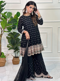 Gharara suit, designer gharara suits, bridal gharara suit, traditional gharara, gharara suit online, party wear gharara, Pakistani gharara suits, gharara dress, latest gharara designs, wedding gharara suit, embroidered gharara, heavy gharara suits, festive gharara, gharara suit for women, ethnic gharara.