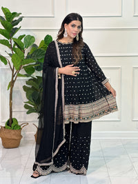 Gharara suit, designer gharara suits, bridal gharara suit, traditional gharara, gharara suit online, party wear gharara, Pakistani gharara suits, gharara dress, latest gharara designs, wedding gharara suit, embroidered gharara, heavy gharara suits, festive gharara, gharara suit for women, ethnic gharara.