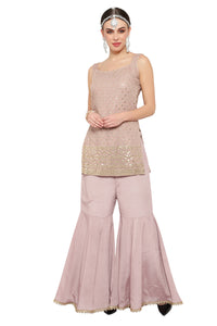 Gharara suit, designer gharara suits, bridal gharara suit, traditional gharara, gharara suit online, party wear gharara, Pakistani gharara suits, gharara dress, latest gharara designs, wedding gharara suit, embroidered gharara, heavy gharara suits, festive gharara, gharara suit for women, ethnic gharara.