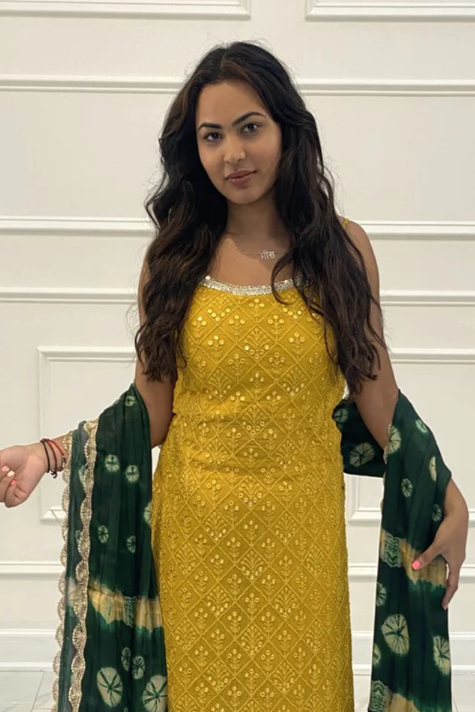 Gharara suit, designer gharara suits, bridal gharara suit, traditional gharara, gharara suit online, party wear gharara, Pakistani gharara suits, gharara dress, latest gharara designs, wedding gharara suit, embroidered gharara, heavy gharara suits, festive gharara, gharara suit for women, ethnic gharara.