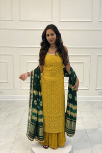 Gharara suit, designer gharara suits, bridal gharara suit, traditional gharara, gharara suit online, party wear gharara, Pakistani gharara suits, gharara dress, latest gharara designs, wedding gharara suit, embroidered gharara, heavy gharara suits, festive gharara, gharara suit for women, ethnic gharara.
