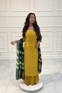 Gharara suit, designer gharara suits, bridal gharara suit, traditional gharara, gharara suit online, party wear gharara, Pakistani gharara suits, gharara dress, latest gharara designs, wedding gharara suit, embroidered gharara, heavy gharara suits, festive gharara, gharara suit for women, ethnic gharara.