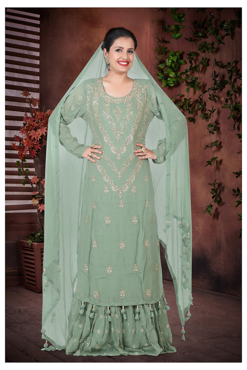 Gharara suit, designer gharara suits, bridal gharara suit, traditional gharara, gharara suit online, party wear gharara, Pakistani gharara suits, gharara dress, latest gharara designs, wedding gharara suit, embroidered gharara, heavy gharara suits, festive gharara, gharara suit for women, ethnic gharara.