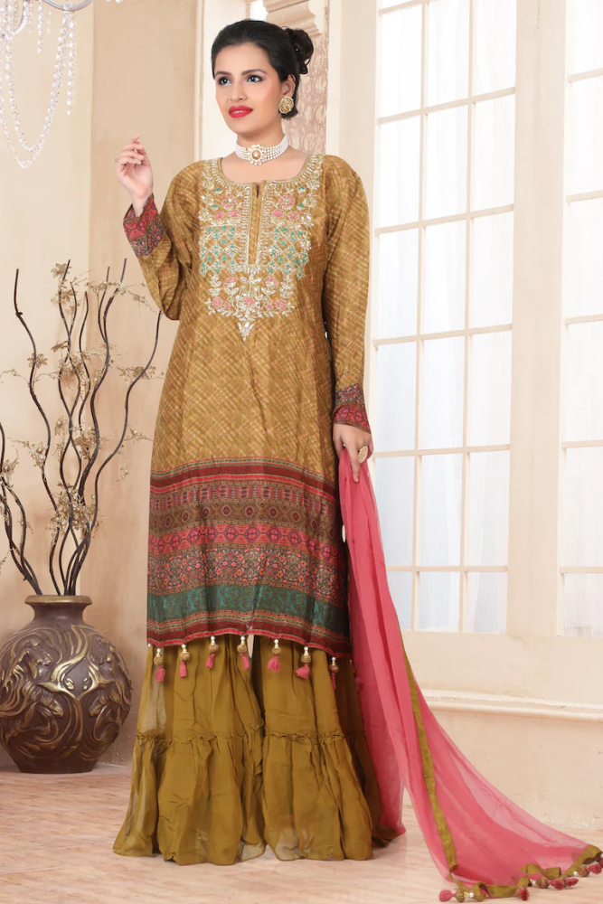 Gharara suit, designer gharara suits, bridal gharara suit, traditional gharara, gharara suit online, party wear gharara, Pakistani gharara suits, gharara dress, latest gharara designs, wedding gharara suit, embroidered gharara, heavy gharara suits, festive gharara, gharara suit for women, ethnic gharara.