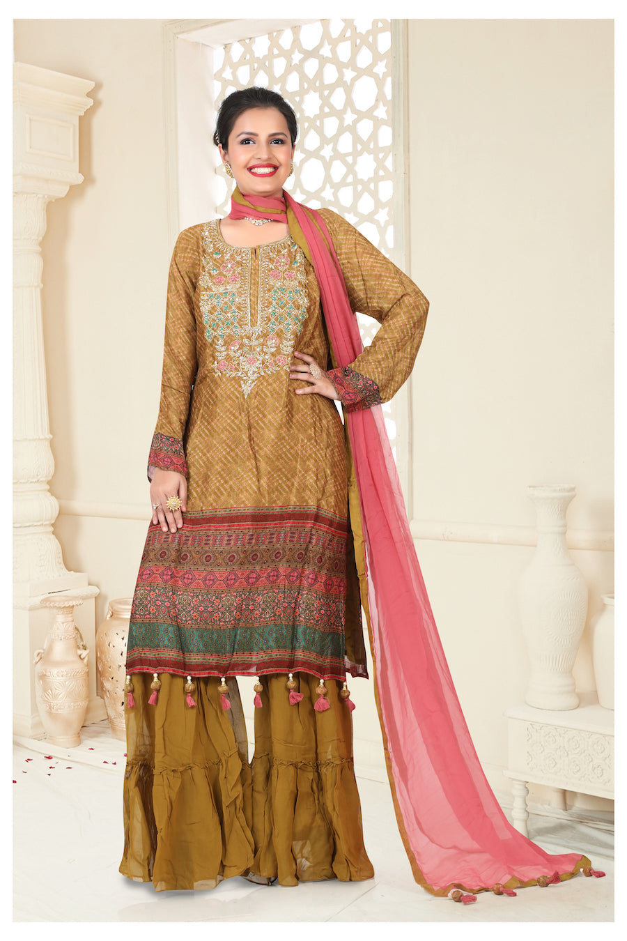 Gharara suit, designer gharara suits, bridal gharara suit, traditional gharara, gharara suit online, party wear gharara, Pakistani gharara suits, gharara dress, latest gharara designs, wedding gharara suit, embroidered gharara, heavy gharara suits, festive gharara, gharara suit for women, ethnic gharara.