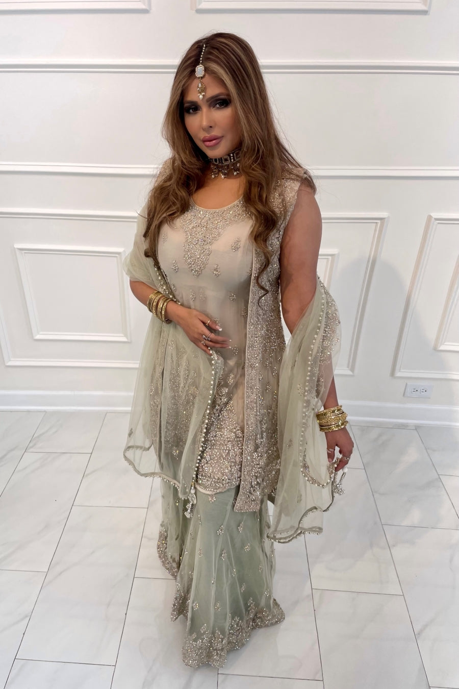 Gharara suit, designer gharara suits, bridal gharara suit, traditional gharara, gharara suit online, party wear gharara, Pakistani gharara suits, gharara dress, latest gharara designs, wedding gharara suit, embroidered gharara, heavy gharara suits, festive gharara, gharara suit for women, ethnic gharara