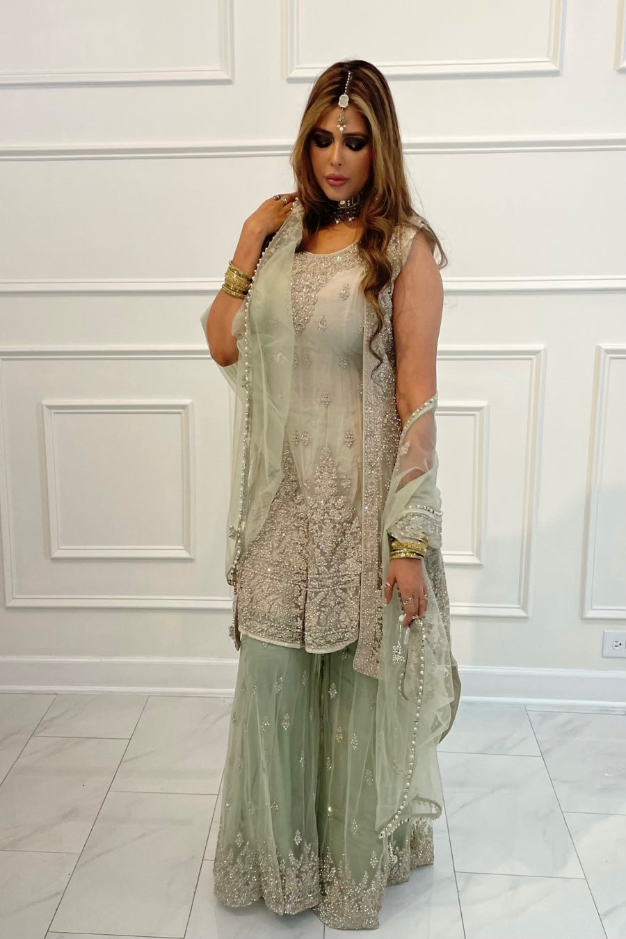 Gharara suit, designer gharara suits, bridal gharara suit, traditional gharara, gharara suit online, party wear gharara, Pakistani gharara suits, gharara dress, latest gharara designs, wedding gharara suit, embroidered gharara, heavy gharara suits, festive gharara, gharara suit for women, ethnic gharara