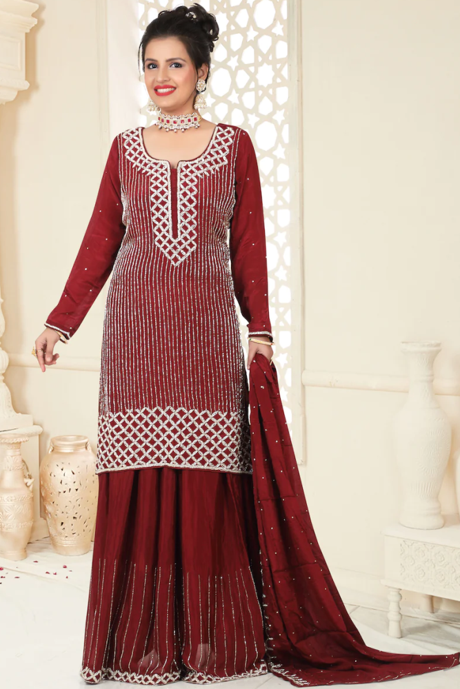 Gharara suit, designer gharara suits, bridal gharara suit, traditional gharara, gharara suit online, party wear gharara, Pakistani gharara suits, gharara dress, latest gharara designs, wedding gharara suit, embroidered gharara, heavy gharara suits, festive gharara, gharara suit for women, ethnic gharara