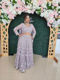 Lavender color Lehenga Choli with Heavy Work Blouse and Dupatta.